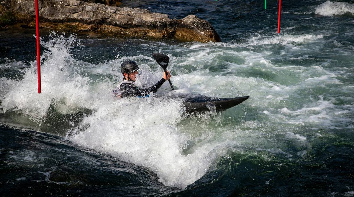 Infographic showing common kayak rental insurance exclusions, highlighting spray skirts in red with a 'not covered' icon